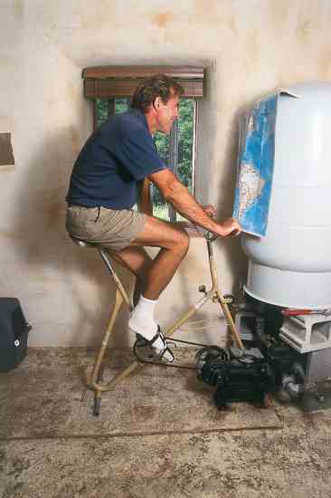 A converted exercise bike serves as a water pump. Five to 10 minutes every other day is usually all that is needed to supply their daily water needs.